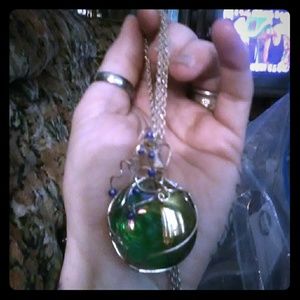 2 necklaces. In one wrap around bracelet